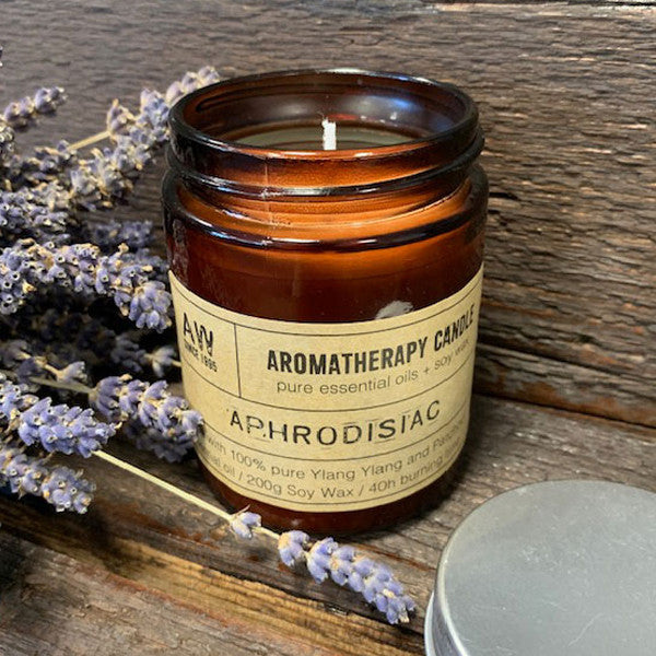 Zelyth Aromatherapy Candle - Aphrodisiac. A luxurious candle crafted to enhance romantic rituals, filling your space with captivating, mood-setting aromas. Perfect for creating an intimate ambiance, fostering relaxation, and indulging in moments of connection and passion.