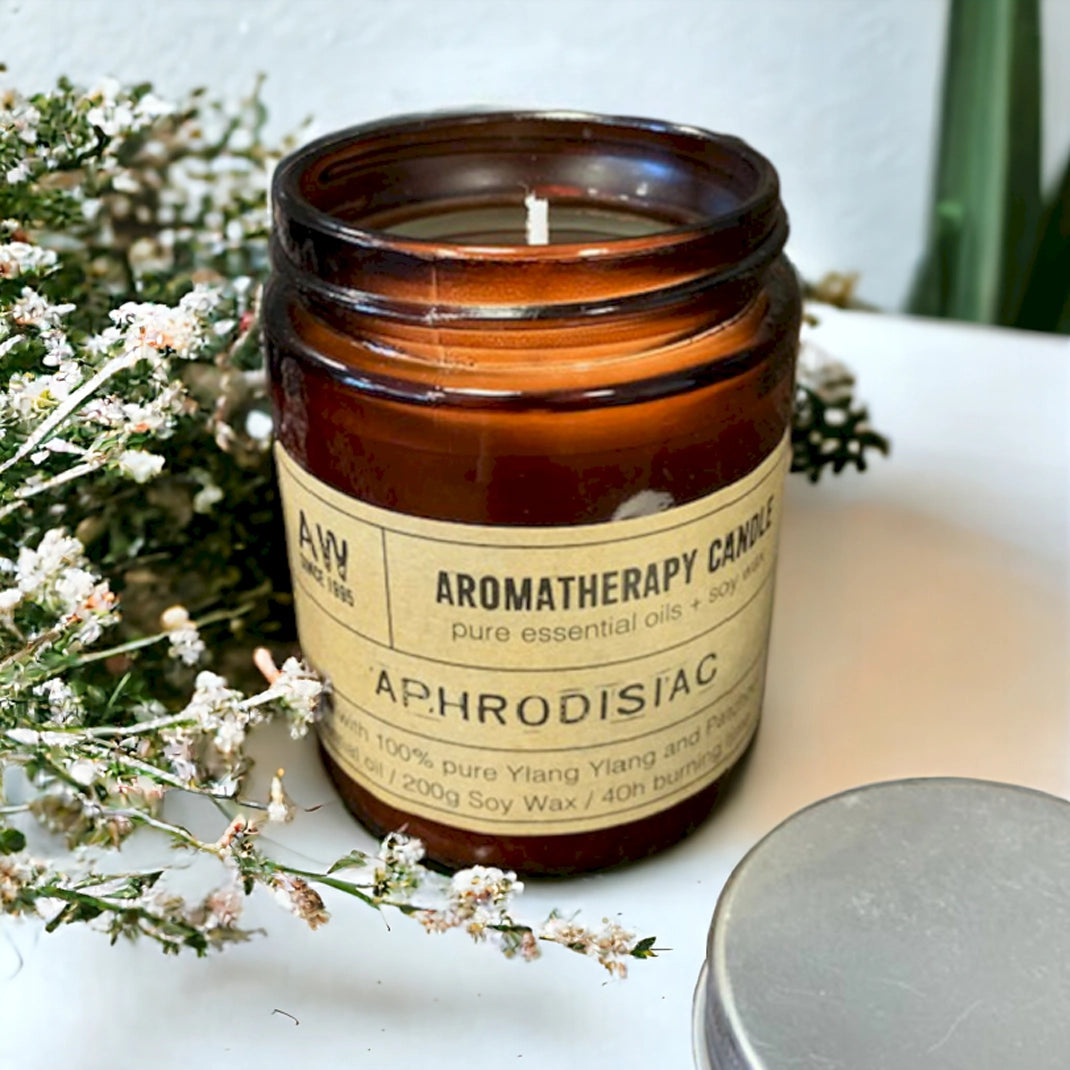 Zelyth Aromatherapy Candle - Aphrodisiac. A luxurious candle crafted to enhance romantic rituals, filling your space with captivating, mood-setting aromas. Perfect for creating an intimate ambiance, fostering relaxation, and indulging in moments of connection and passion.