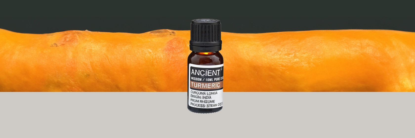 Zelyth turmeric essential oil aromatherapy grounding soothing natural wellness stress relief anti-inflammatory earthy fragrance rejuvenating