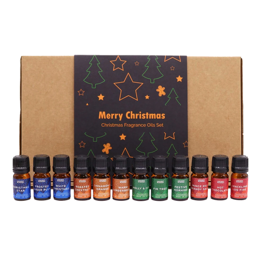 Zelyth's Holy Scents of Christmas Fragrance Set offers a curated collection of festive aromas. Featuring scents like cinnamon, orange, and fir tree, this set creates a warm, inviting atmosphere. Perfect for the holiday season, it enhances any space with natural, vegan fragrances. Ideal for diffusers or personal use, it brings Christmas cheer to your home.